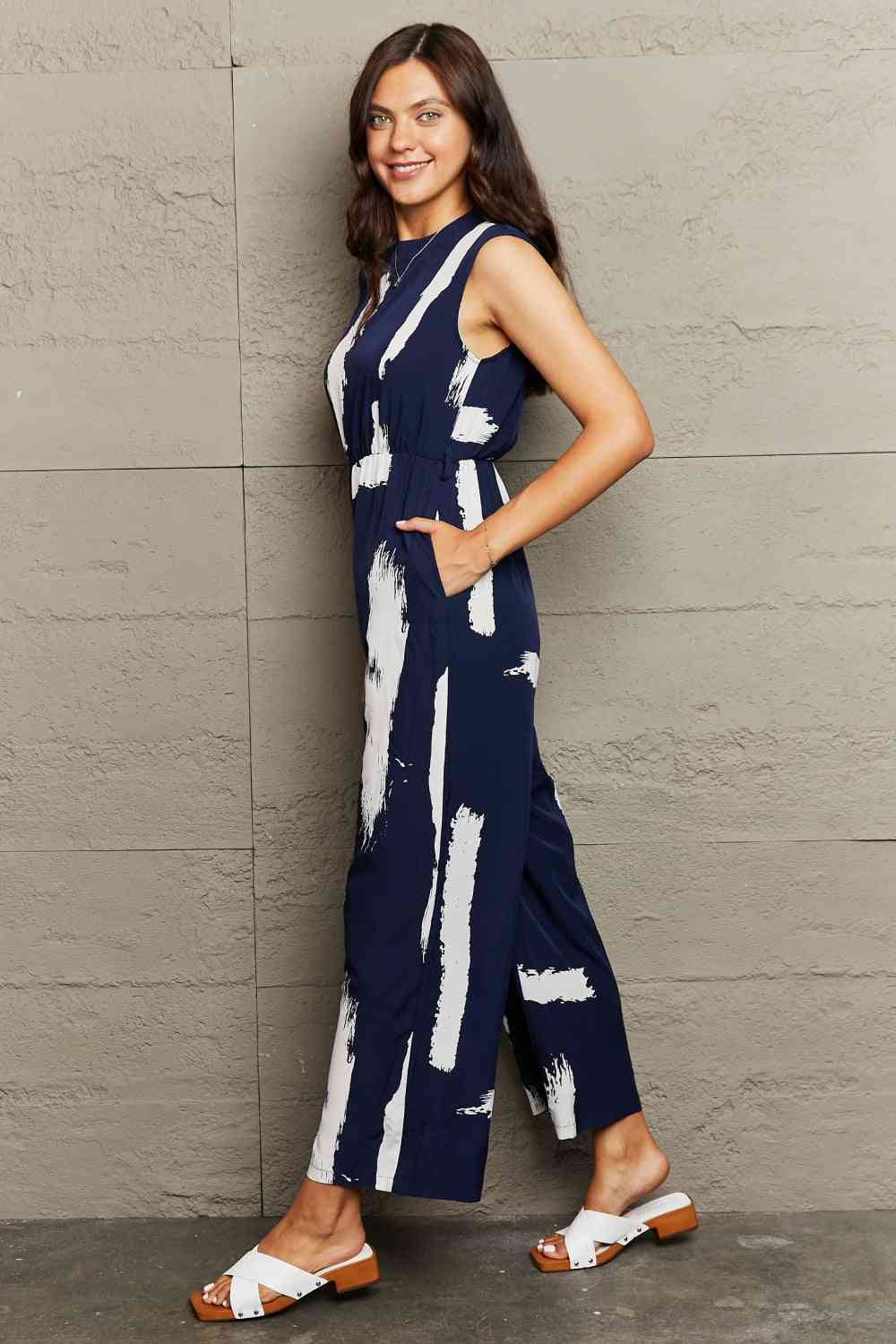 Women’s Printed Round Neck Cutout Jumpsuit with Pockets