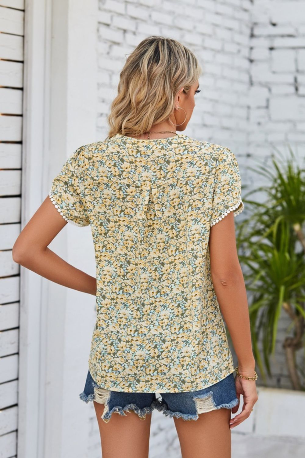 Women’s Floral Notched Neck Blouse