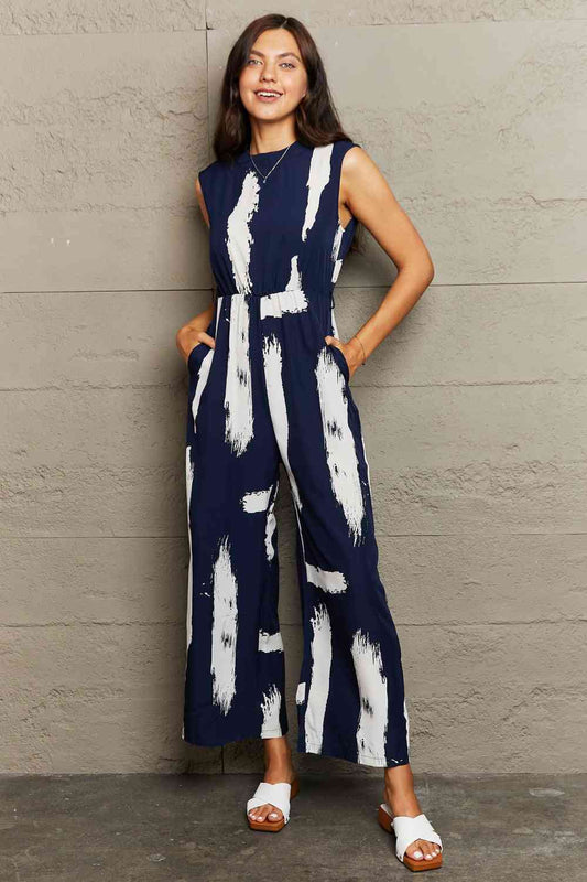 Women’s Printed Round Neck Cutout Jumpsuit with Pockets